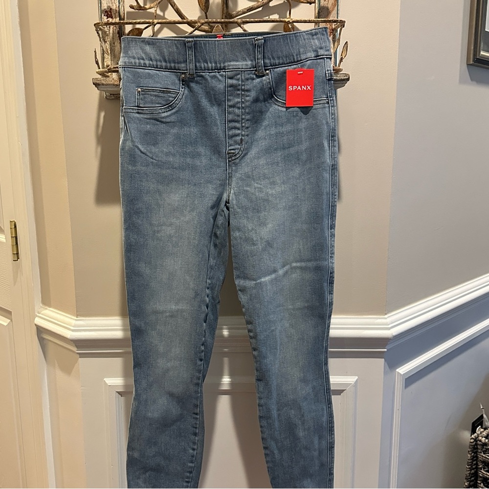 SPANX® light vintage wash denim leggings size small.